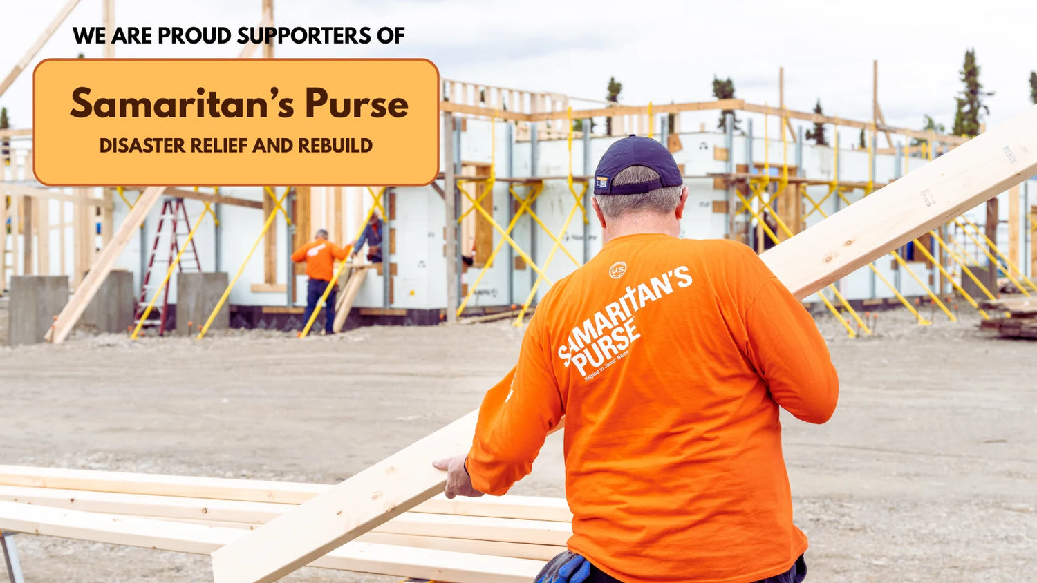 Samaritan's Purse volunteer carrying lumber